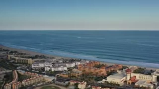 LOS CABOS MEXICO-2020: Coastal Resorts At Sunset With Beautiful Blue Ocean Waves