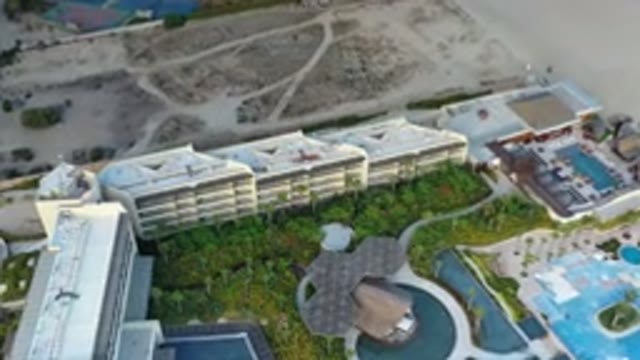 LOS CABOS MEXICO-2020: A View Of A Huge Building With Swimming Pools And Gardens