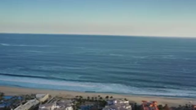 LOS CABOS MEXICO-2020: Beautiful Clear Sky Above Ocean As Waves Wash Ashore Near