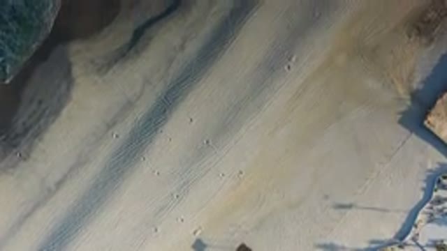 LOS CABOS MEXICO-2020: Footage Of Beautiful Beach With Footsteps In The Sand And Crashing Waves