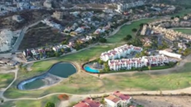 LOS CABOS MEXICO-2020: Aerial View Of A Golf Course That Surrounds A Group Of