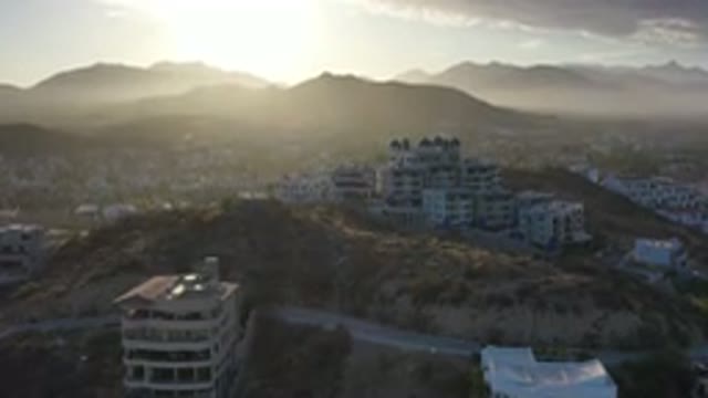 LOS CABOS MEXICO-2020: Aerial View Of Rural City Sat On Hillside With Large