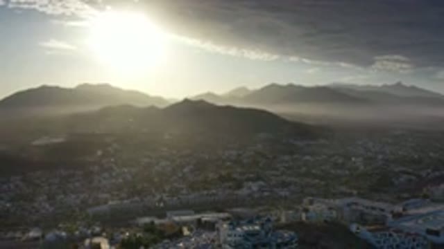 LOS CABOS MEXICO-2020: Long View Of Sky With Sun Light And Slow Motion Trees