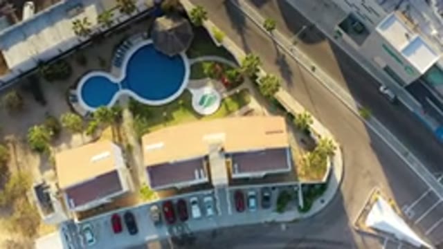 LOS CABOS MEXICO-2020: Sky View Of A Hotel With A Blue Swimming Pool In The City