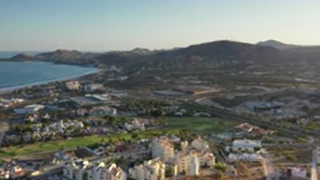 LOS CABOS MEXICO-2020: Aerial View During Sunrise Of A Coastal Resort Town With