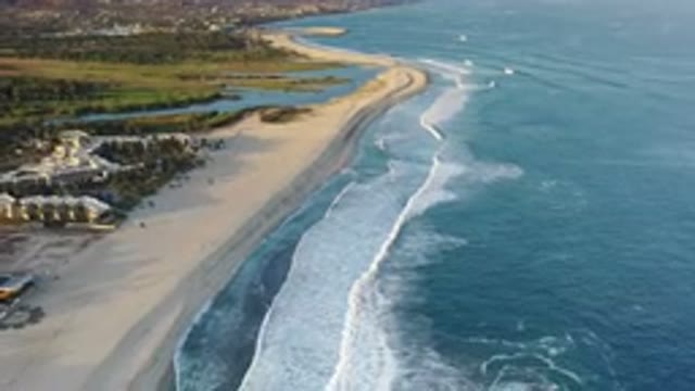 LOS CABOS MEXICO-2020: Beach Side Wide Ocean Waters Flowing Furiously Blue Sea