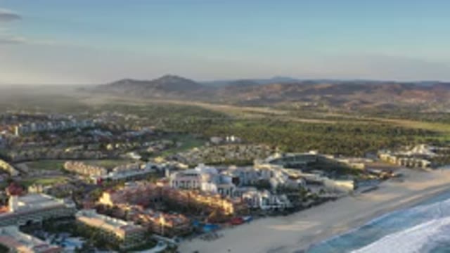 LOS CABOS MEXICO-2020: A City Near a Large Beach with Mountains in the Distance