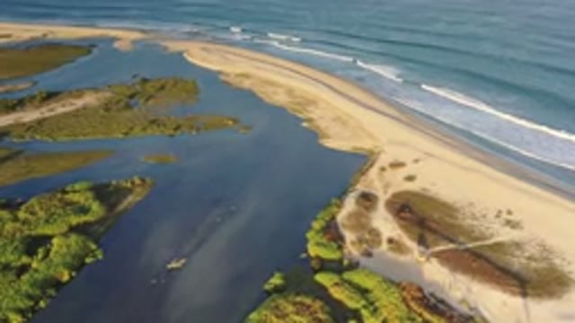 LOS CABOS MEXICO-2020: Beautiful Ocean Sandbar Beach With Gentle Waves Crashing
