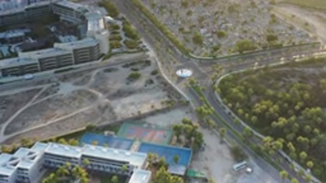 LOS CABOS MEXICO-2020: Aerial View Of City With Trees And Buildings As Car Drives