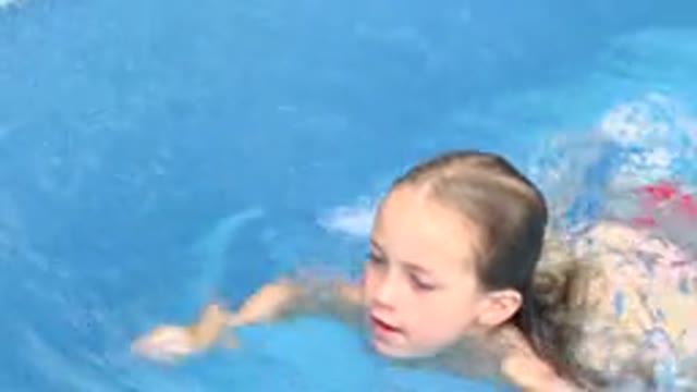 LOS CABOS MEXICO-2020: A Kid Learning To Swim In A Pool