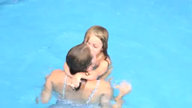 LOS CABOS MEXICO-2020: Mother And Daughter Play In A Pool