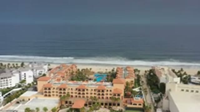 LOS CABOS MEXICO-2020: Aerial View Of Buildings Near Ocean And Sandy Beach With