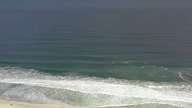 LOS CABOS MEXICO-2020: The Calm Waters of a Green Sea with Sparkling Waves