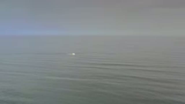 LOS CABOS MEXICO-2020: Beautiful View Of The Sea Under The Cloudy Sky With A Small Boat Crossing