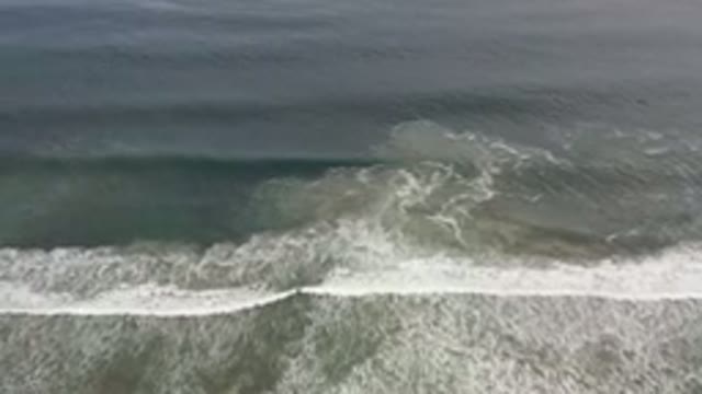 LOS CABOS MEXICO-2020: Aerial View Of A Green Sea With Waves On A Clear Day