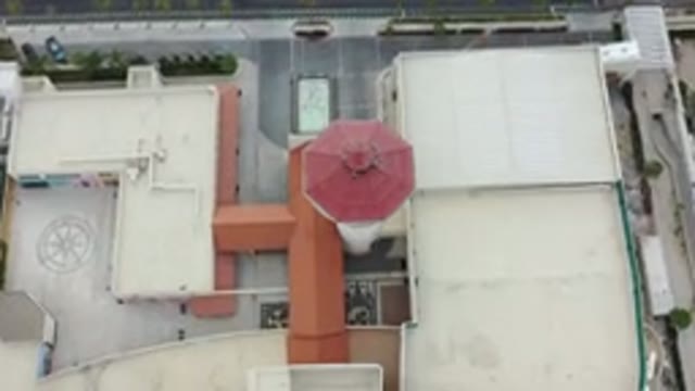 LOS CABOS MEXICO-2020: Aerial View Of Concrete Tan And Red Rooftops Above