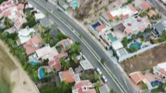 LOS CABOS MEXICO-2020: Panning Upward On Construction In An Idyllic Town With