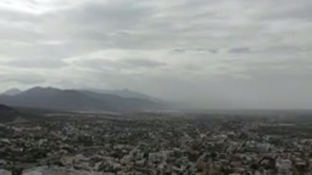 LOS CABOS MEXICO-2020: Panning Camera Survey Of Congested Town With Hilly