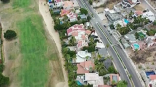 LOS CABOS MEXICO-2020: Aerial View Of City Landscape Showing Mountains Beach And