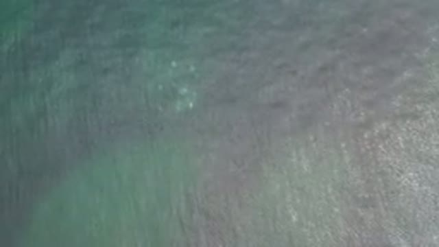 LOS CABOS MEXICO-2020: Gentle Waves Sparkle On Ocean Surface As Light Shines On