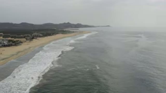 LOS CABOS MEXICO-2020: Ocean And Mountains With Cloudy Sky