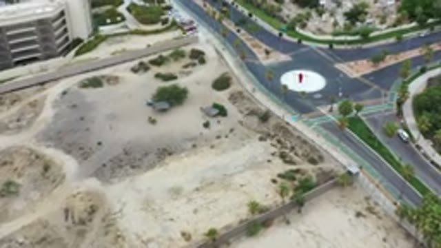 LOS CABOS MEXICO-2020: Top View Of Roundabout Highway Near Large Buildings