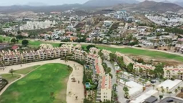 LOS CABOS MEXICO-2020: Footage Of Green Fields Next To A City With Big And
