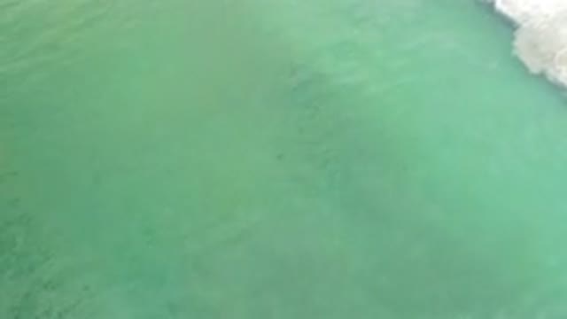 LOS CABOS MEXICO-2020: Calm Moving Water Where a Small Wave Forms and Rolls