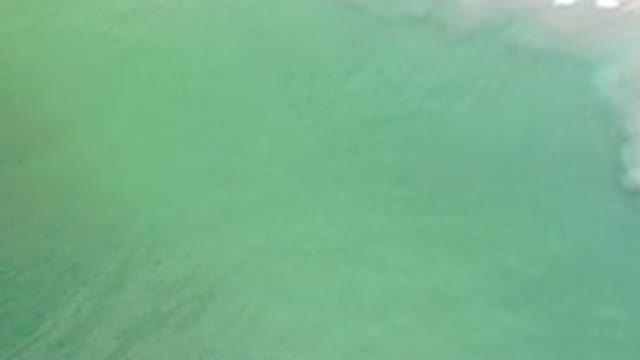 LOS CABOS MEXICO-2020: Rippling Green Expanse Of Water With Soft Tide Driven