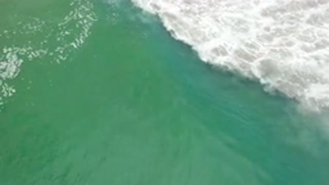 LOS CABOS MEXICO-2020: Ocean Waves Crashing on Sandy Beach