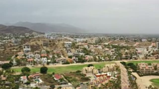 LOS CABOS MEXICO-2020: Green Plains And Many Houses On A Clear Day