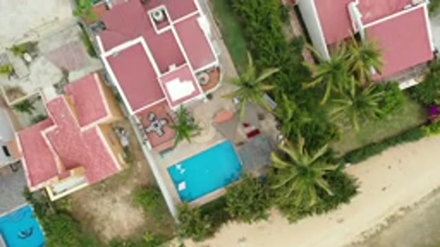LOS CABOS MEXICO-2020: Aerial View Of Home With Terra-Cotta Colored Roofing In A