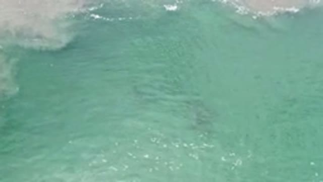 LOS CABOS MEXICO-2020: Green And Crystal Clear Sea Water Rippling Slightly Like