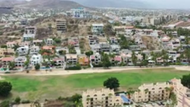 LOS CABOS MEXICO-2020: A Mountainous City Full Of Buildings Midst Many Trees And