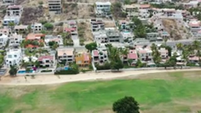 LOS CABOS MEXICO-2020: Aerial View Of Green Space And Rooftops Of Buildings With