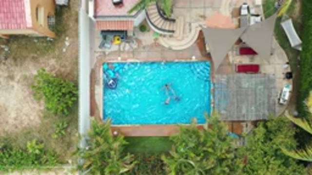 LOS CABOS MEXICO-2020: Three Children Playing In The Swimming Pool