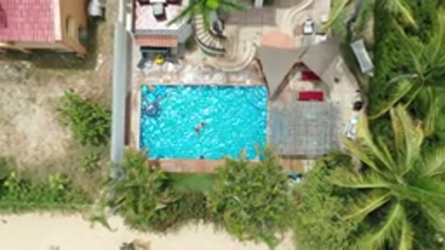 LOS CABOS MEXICO-2020: Residential Swimming Pool In Use Showing Nearby House And