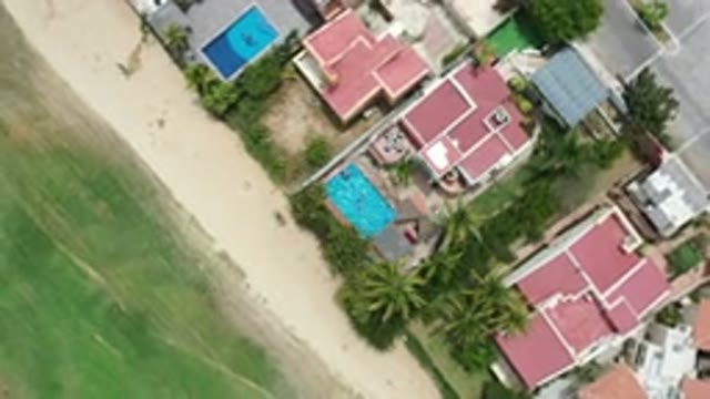 LOS CABOS MEXICO-2020: Birds Eye View Of A Sparkling Pool Surrounded By Red Roofs