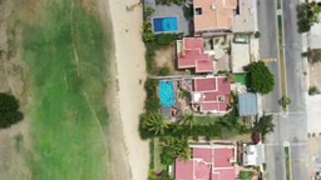 LOS CABOS MEXICO-2020: Aerial View Of A Neighborhood With Pools And Palms