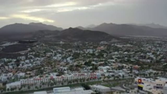 LOS CABOS MEXICO-2020: Bright Large City Scattered Across Low Hills
