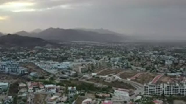 LOS CABOS MEXICO-2020: Aerial View Of Houses Buildings Streets And Mountains On