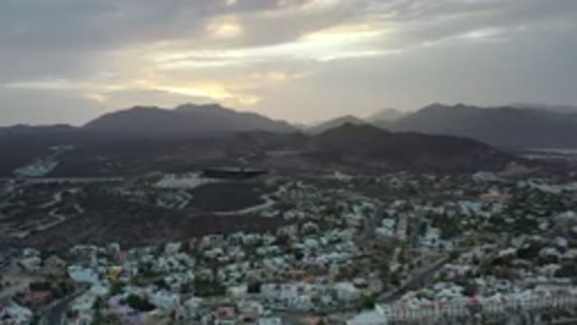 LOS CABOS MEXICO-2020: Slow Zoom Aerial View Of Mountains And Trees Surrounding