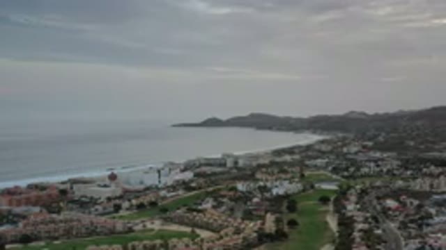 LOS CABOS MEXICO-2020: The Nice View Of Sea City With Mountain And Buildings