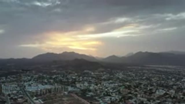 LOS CABOS MEXICO-2020: Tall Beautiful Mountain Range Towers Above Sprawling City