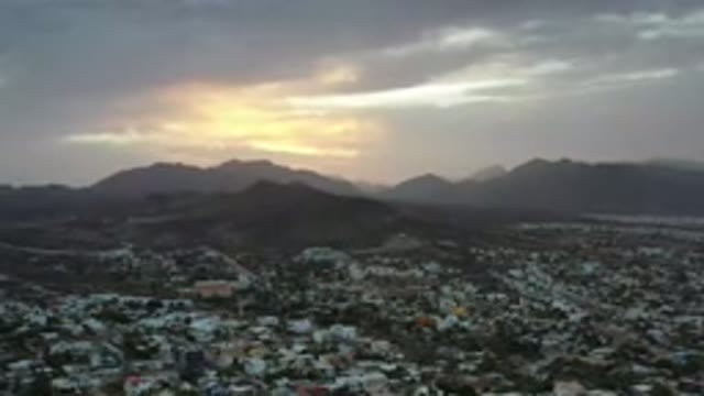 LOS CABOS MEXICO-2020: Sunlight Peaks Through Clouds As Sky Clears Over