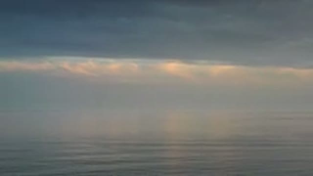 LOS CABOS MEXICO-2020: The Cloudy Sky Blends With the Calm Ocean