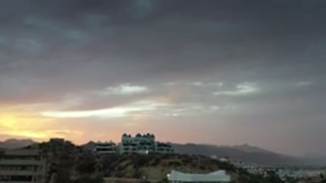 LOS CABOS MEXICO-2020: View Of Sunrise With A Cloudy Sky Looking On A Hilltop