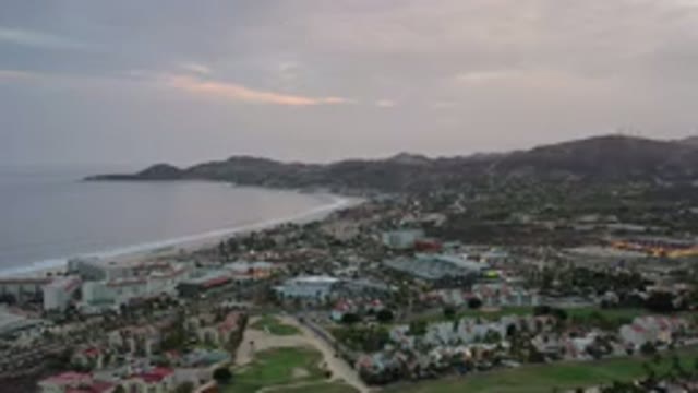LOS CABOS MEXICO-2020: Cinematic View Of Beach With Glimpse Of City And Blue Sky