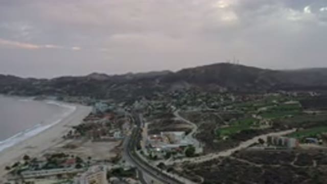 LOS CABOS MEXICO-2020: Sky View Of Beach Area With Houses And Mountains On A