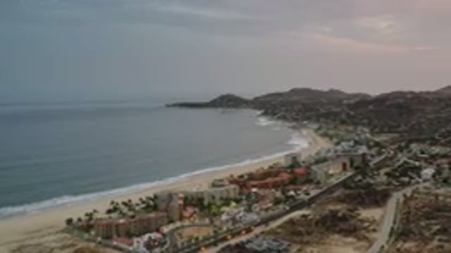 LOS CABOS MEXICO-2020: Trees And A Blue Sky With Lots Of Clouds And A Sea
